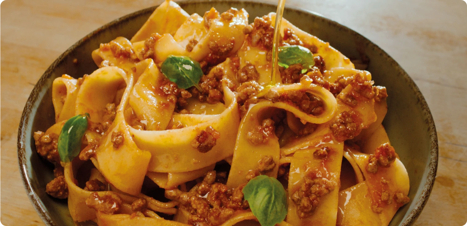 Olive oil drizzled over pasta